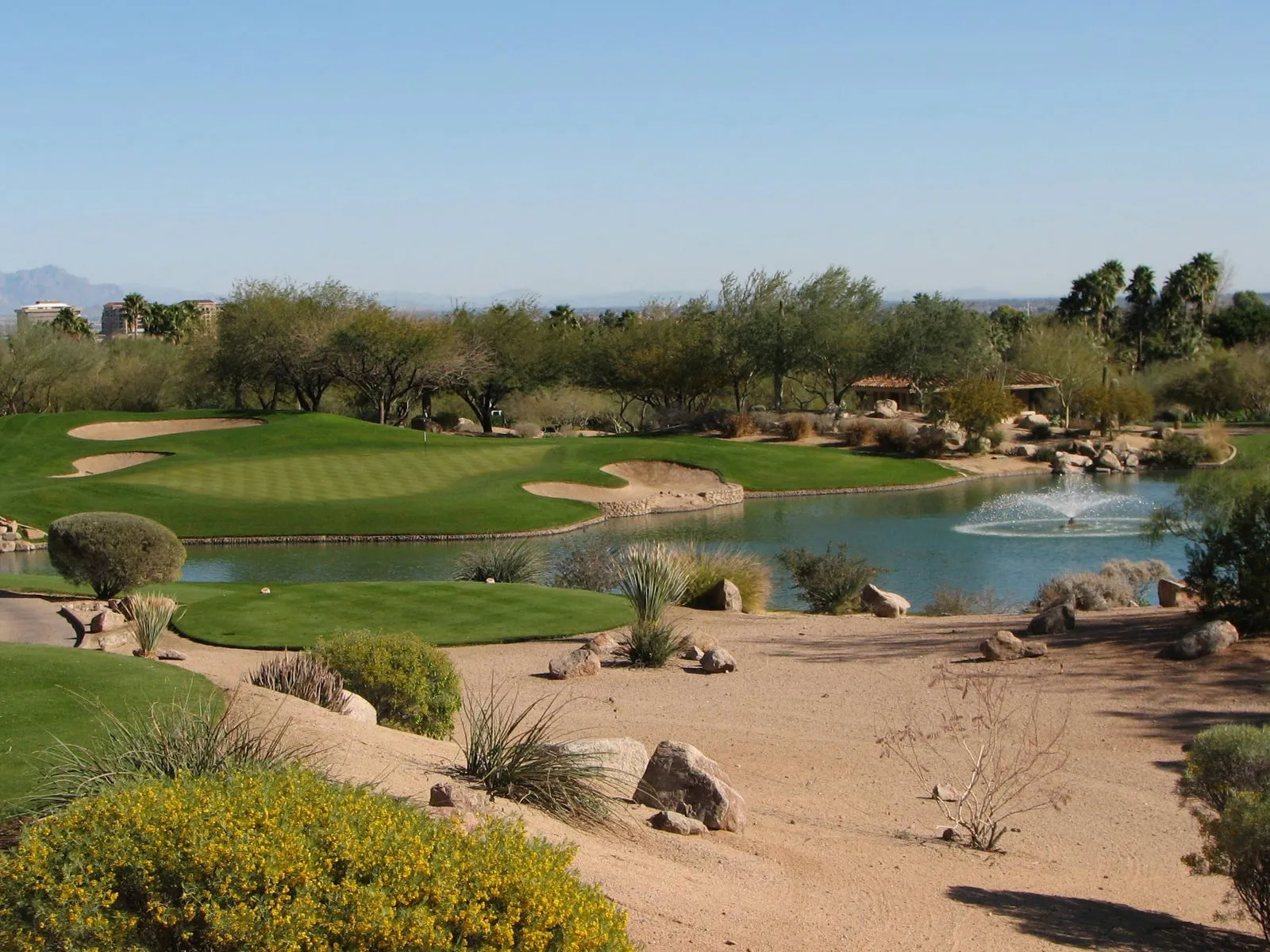 The desert golf course and lake at The Phoenician resort in Scottsdale, Arizona