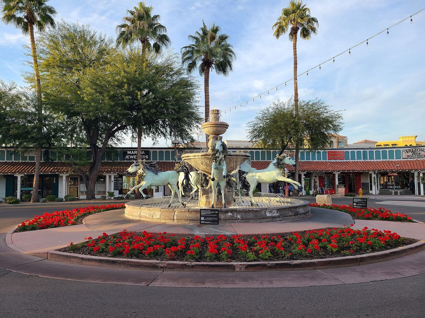 The Bronze Horse Fountain sculpture of running Arabian horses on 5th Avenue in Scottsdale
