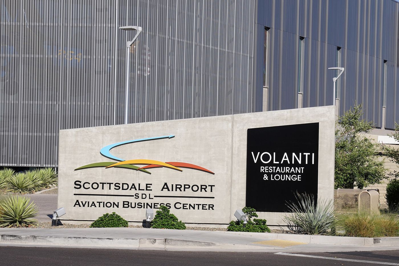 Scottsdale Airport and the surrounding Airpark business district, with the McDowell Mountains beyond